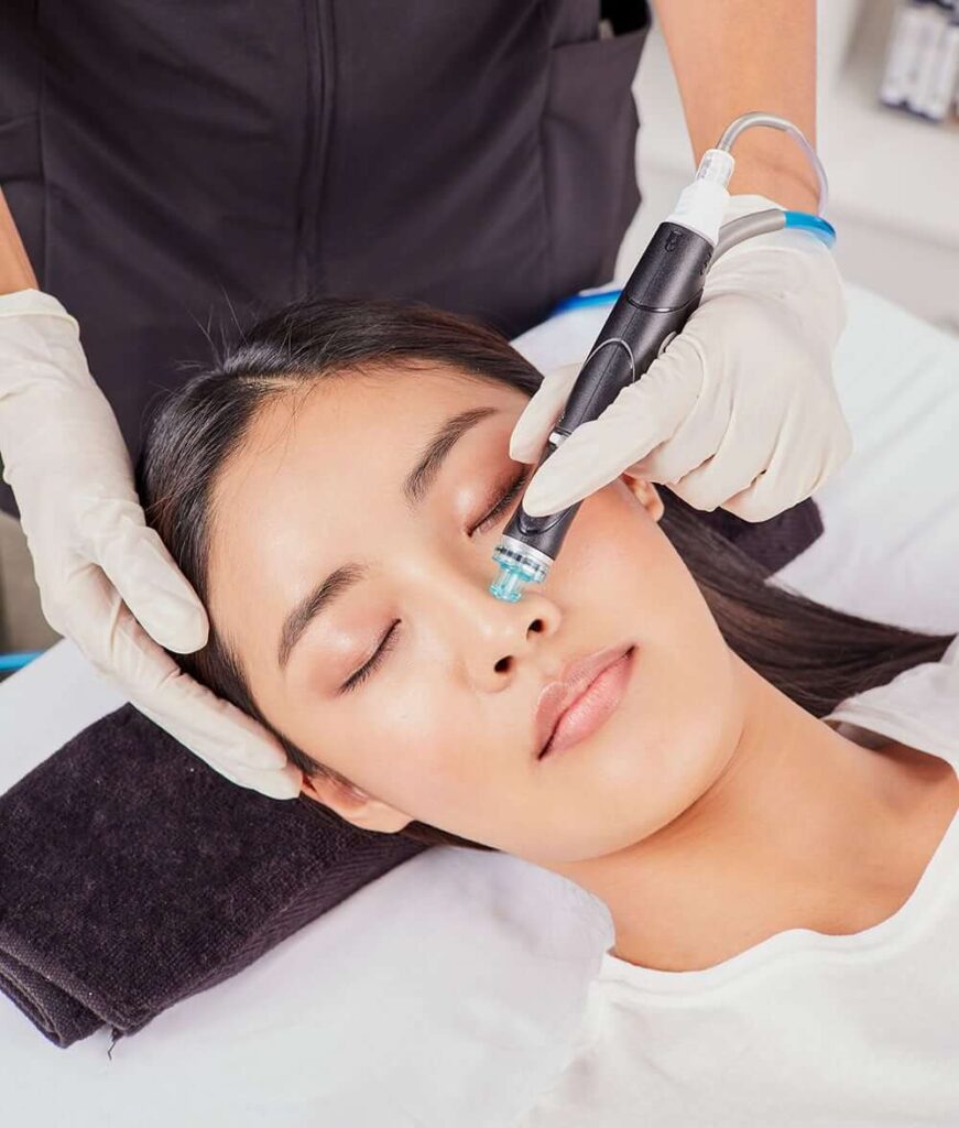 woman receiving hydra facial