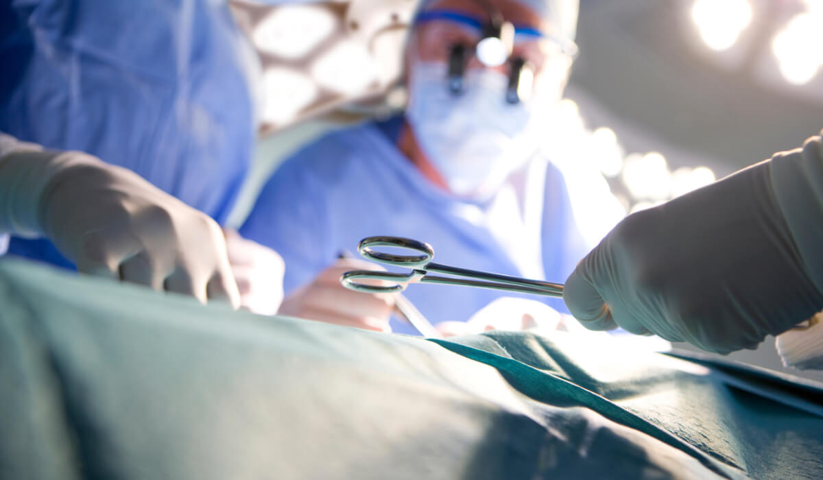 Close-up of surgeons operating